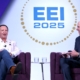 Louisiana Governor Jeff Landry and Entergy Chair and Chief Executive Officer Drew Marsh share a moment on stage at EEI 2025 in New Orleans, Louisiana.