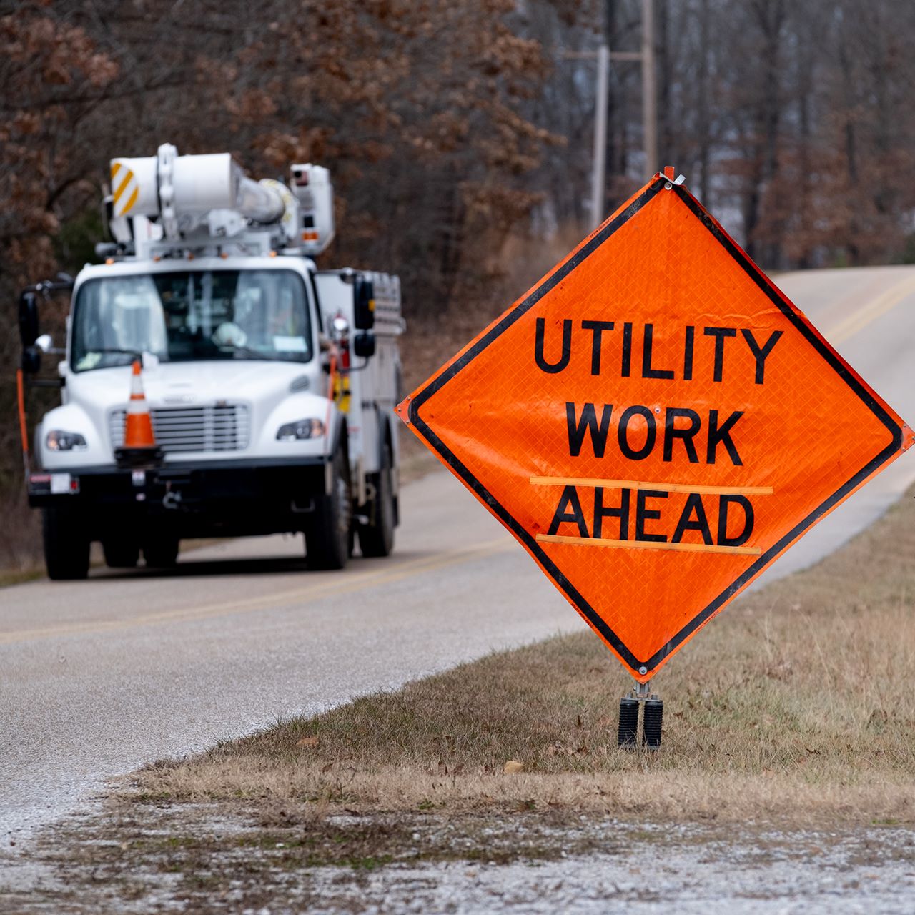 utility-work-ahead-sign-truck