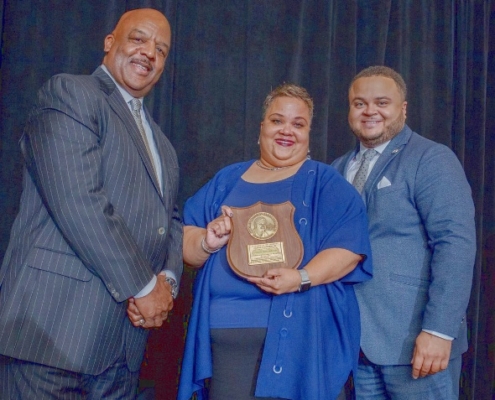 Pictured: Whitney M. Young Jr. Service Award recipient Demetric Mercadel is shown with Diversity in Scouting Gala chairman Jimmie Woods Sr. (left) and her son, Todd C. James, who introduced and presented her award.