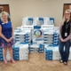 Entergy Texas employees prepare to distribute fans at the United Board of Missions in Port Arthur, Texas.