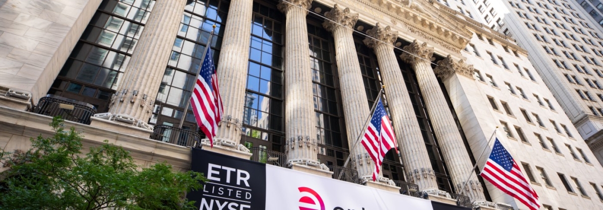 Entergy stock symbol and logo signs at the New York Stock Exchange