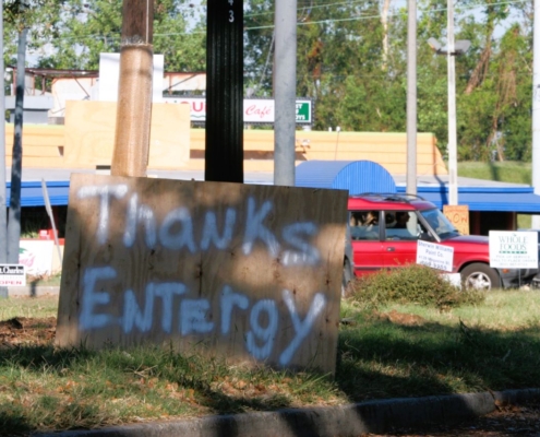 Plywood sign that says 'Thanks Entergy' spotted in September 2005 in New Orleans, Louisiana, after Hurricane Katrina made landfall.